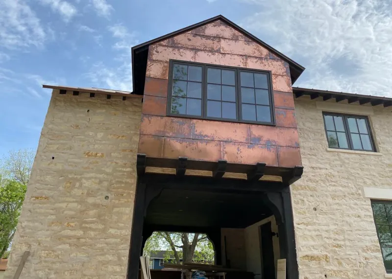 Copper metal panel facade on a stone building for Metal Roof Coating in Mill Valley