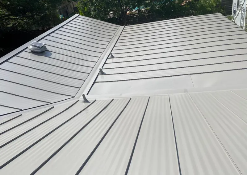 Solar attic fan installed on a metal roof for Roof Ventilation in Mill Valley